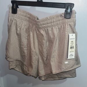 Legend Women's Performance Athletic Shorts in Tan